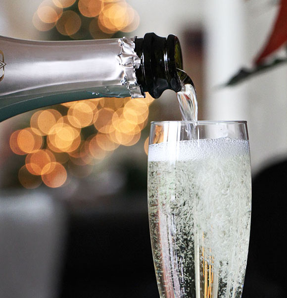 Why do we drink champagne on New Year's Eve?