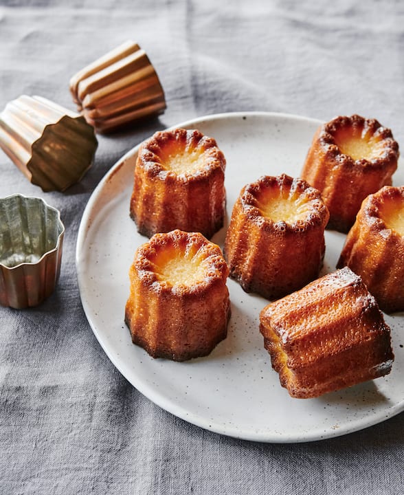 Premium Photo | Canele cake traditional france dessert traditional caneles  de bordeaux abstract generative ai illustration